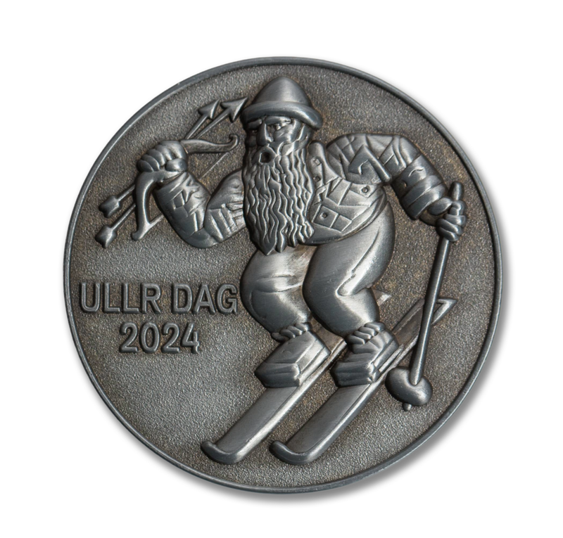 Medal with a depiction of a person on skis and archery, with 'ULLR DAG 2024' text.