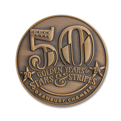 Bronze coin commemorating 50 years of Stars & Stripes with Granbury Chamber text