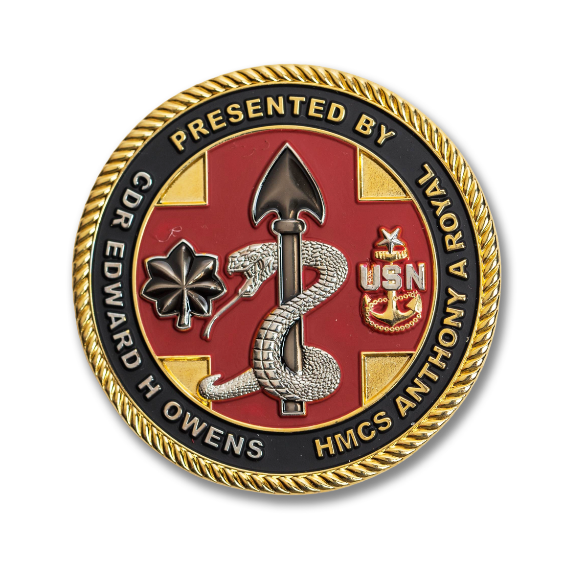 Decorative coin with military symbols and text on a white background